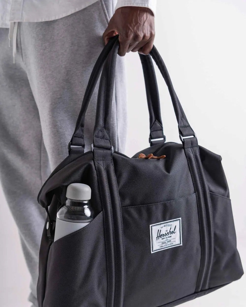 Herschel strand deals tote